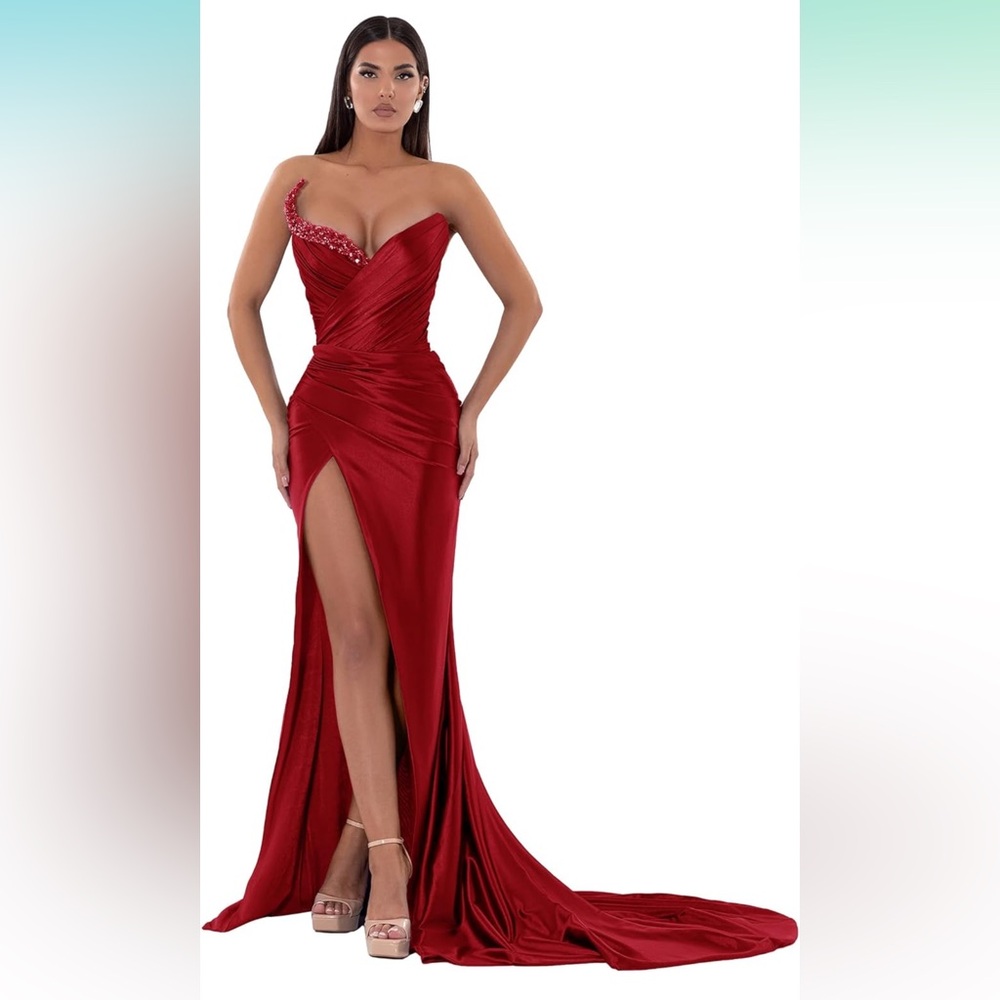 Strapless red formal gown with beaded chest, mermaid style with a slit
